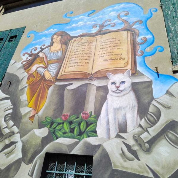 Murales L'Ecologia con gatto e fanciulla - Borgo di Saludecio (RN)